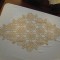 Macrame (mileu) de culoare bej (2) forma de romb, avand diagonalele de 95x55 cm