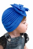 Caciulita albastra tip turban cu model din tesatura si funda aplicata (Marime