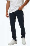 Cumpara ieftin Blugi barbati cu talie joasa si croiala slim fit bleumarin inchis, W34 L32, Calvin Klein Jeans