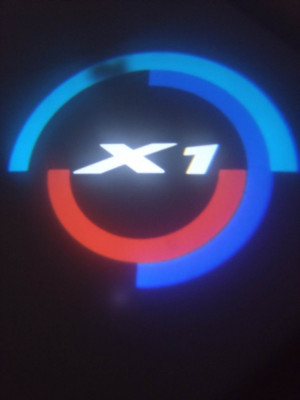 Set 2 Holograme LED cu LOGO BMW X1 pentru Portiere foto