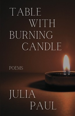 Table with Burning Candle foto