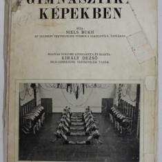 GIMNASTIKA KEPEKBEN ( GIMNASTICA IN IMAGINI ) de NIELS BUKH , EDITIE IN LIMBA MAGHIARA , 1927 , COPERTA CU FRAGMENTE LIPSA , PREZINTA HALOURI DE APA