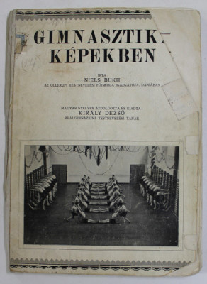 GIMNASTIKA KEPEKBEN ( GIMNASTICA IN IMAGINI ) de NIELS BUKH , EDITIE IN LIMBA MAGHIARA , 1927 , COPERTA CU FRAGMENTE LIPSA , PREZINTA HALOURI DE APA foto