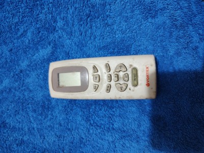 Telecomanda aer conditionat / telecomenzi aer conditionat ORIGINALE, VORTEX , stare foarte buna, perfect functionala !! foto