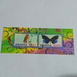Bloc de 2 timbre &bdquo;Fluturi și Bufnițe&rdquo; (Butterflies and Owls V) emis de Rwanda &icirc;n anul 2011 CTO