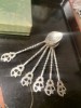 Set lingurite argint marcate, Tacamuri