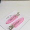Set de agrafe roz Dior