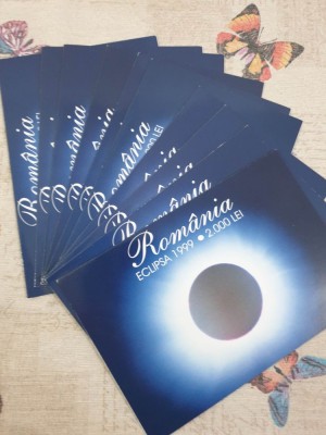 Lot bancnote 2000 lei Eclipsa in folder . Lot 10 buc. seria 001A UNC foto