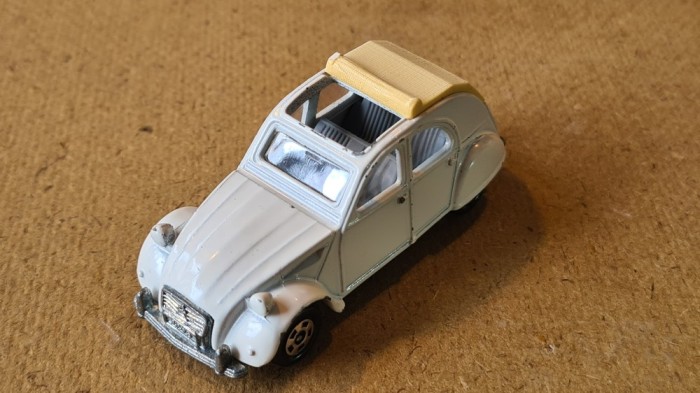 Macheta auto veche de colectie: Tomica (Tomy) Citro&euml;n 2CV - No. F39, sc 1:57, fabricata in Japonia anii 1978-1983