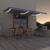 VidaXL Copertină automată cu senzor v&acirc;nt&amp;LED, albastru/alb, 600x300 cm