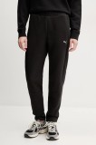 Puma pantaloni de trening femei, culoarea negru, neted, 685051