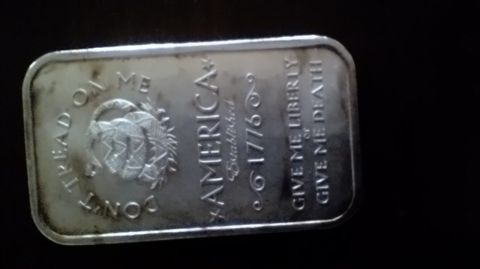 Lingou argint 1 uncie ,puritate 999