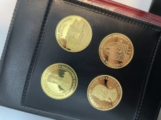 Monede token placate cu aur foto