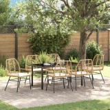 Set de dining de grădină cu 7 piese și perne din rattan poliester de culoare maro.