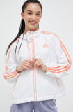 Cumpara ieftin Adidas geaca femei, culoarea alb, de tranzitie, oversize