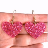 Cumpara ieftin Cercei inimi Glitter fuchsia