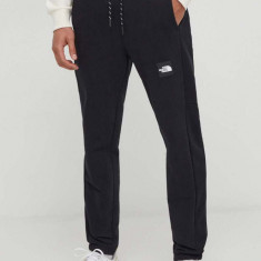 The North Face pantaloni de trening din bumbac culoarea negru, cu imprimeu