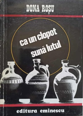 CA UN CLOPOT SUNA LUTUL-DONA ROSU foto