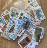 PLIC FILATELIC 50 TIMBRE STRAINE STAMPILATE DIFERITE, TEMA LOCOMOTIVE/TRENURI + BONUS