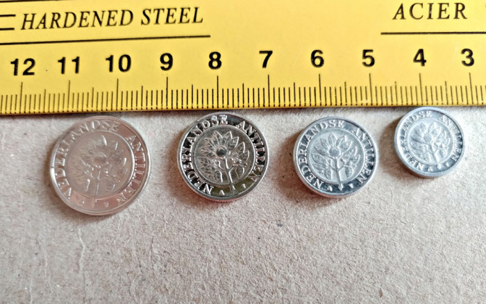 Lot 4 monede Antilele Olandeze 25 centi 10 centi 5 centi 1 cent