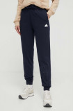 Adidas pantaloni de trening culoarea bleumarin, cu imprimeu IS4286