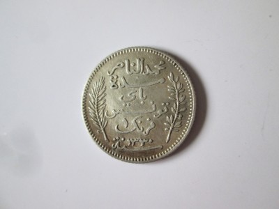 Rară! Tunisia 1 Franc 1912(an rar) argint,moneda din imagini in stare f.buna cu patina frumoasa,diam=23 mm,greutate=5 grame foto