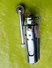 G581-Bricheta mica veche colectie model cartus cu carcasa rabatabila alama cromata stare buna mecamism mai special.