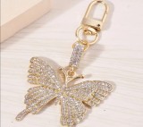 Breloc Fluture Auriu din aliaj cu Pietricele, Accesoriu Elegant pentru Chei și Geanta, 4,6*9 cm
