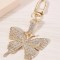 Breloc Fluture Auriu din aliaj cu Pietricele, Accesoriu Elegant pentru Chei și Geanta, 4,6*9 cm