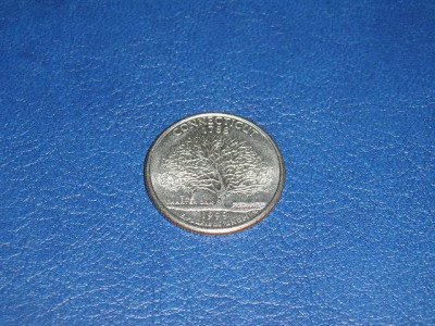 MONEDA AMERICA - QUARTER DOLLAR / SFERT DOLAR - 25 CENTI - EMISE IN ANUL 1999 foto