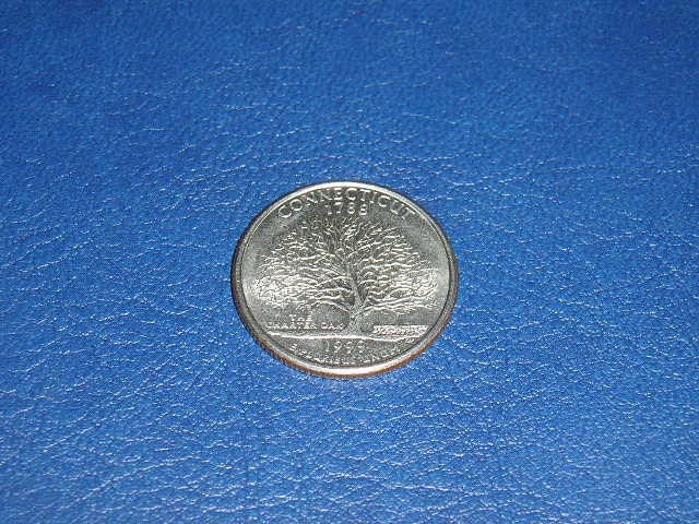 MONEDA AMERICA - QUARTER DOLLAR / SFERT DOLAR - 25 CENTI - EMISE IN ANUL 1999