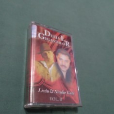 CASETA AUDIO MANELE -DUELUL GIGANTILOR -LIVIU &amp;amp; NICOLAE GUTA VOL 2 RARA!! ORIGINALA foto