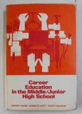 CAREER EDUCATION IN THE MIDDLE/ JUNIOR HIGH SCHOOL by RUPERT N. EVANS , KENNETH B. HOYT , GARTH L. MANGUM , 1973