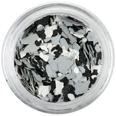 Fulgi de confetti cu o formă nedefinită - albe, gri, negre foto