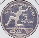 91 Cayman 5 Dollars 1986 Elizabeth II (Commonwealth Games) km 80 proof argint, America Centrala si de Sud