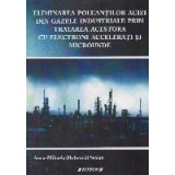 Eliminarea poluantilor acizi din gazele industriale prin tratarea acestora cu electroni accelerati si microunde
