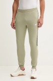 Puma pantaloni de trening culoarea verde, cu imprimeu, 684679