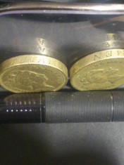 one pound 1987,Decus et Tutanem,batere inversa pe muchie.