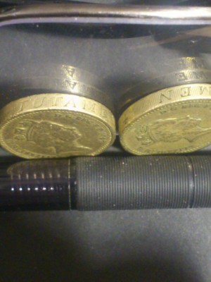 one pound 1987,Decus et Tutanem,batere inversa pe muchie. foto