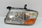 Far st&acirc;nga față MITSUBISHI PAJERO III V7_W, V6_W 2006 OEM: 100-87419 13814716