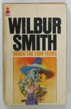WHEN THE LION FEEDS by WILBUR SMITH , 1966 , PREZINTA URME DE UZURA