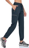 Cumpara ieftin Pantaloni Dama Drumetie BAYGE Albastri M, Impermeabili, Protectie UV, Buzunare cu Fermoar, Talie Ajustabila