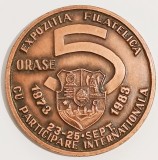 MEDALIE EXPOZITIA FILATELICA 5 ORASE PARTICIPARE INTERNATIONALA 23 25 SEPT 1973 1983 60 DE ANI PRIMA EXPOZITIE TIMISOARA 1923 1983 AFR TIMIS