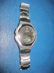 7462- Casio ILUMINATOR vintage Quartz nefunctional model de Lux plat oval.