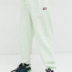 Tommy Jeans pantaloni de trening din bumbac culoarea verde, cu imprimeu