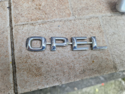 Emblemă portbagaj Opel Astra G foto