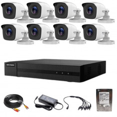 Sistem supraveghere Hikvision TurboHD HiWatch 8 camere 2MP IR 20m lentila 2.8mm DVR 2MP 8 canale cu accesorii HDD 1TB SafetyGuard Surveillance