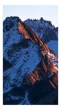Tablou Canvas, "Lumina caldă a muntelui &icirc;n zori", Rocă, Zăpadă, Amurg, V&acirc;rfuri, Umbre, Lumină, Contrast, Măreție, Cald, Rece, 26 x 39 cm, CMCLASS