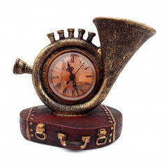 Trompeta cu ceas, asezate pe suport in forma de geamantan, Bronz, 616E