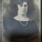 Fotografie tip carte postala, necirculata, femeie cu margele si brosa, 1928